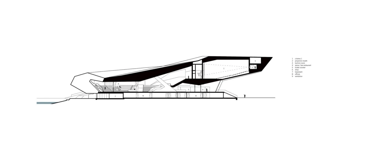 Cross-sectional rendering of a futuristic angular building with multiple interior levels beside water