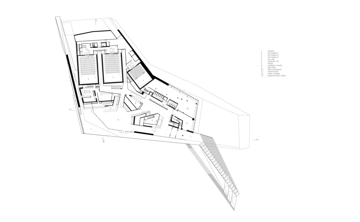 Architectural floor plan of an angular building showing interior rooms, corridors, and a long exterior staircase on the right.