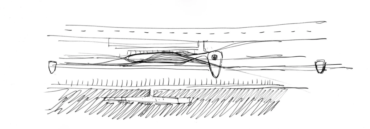 Side view of a small airplane with cockpit, parked on a runway.