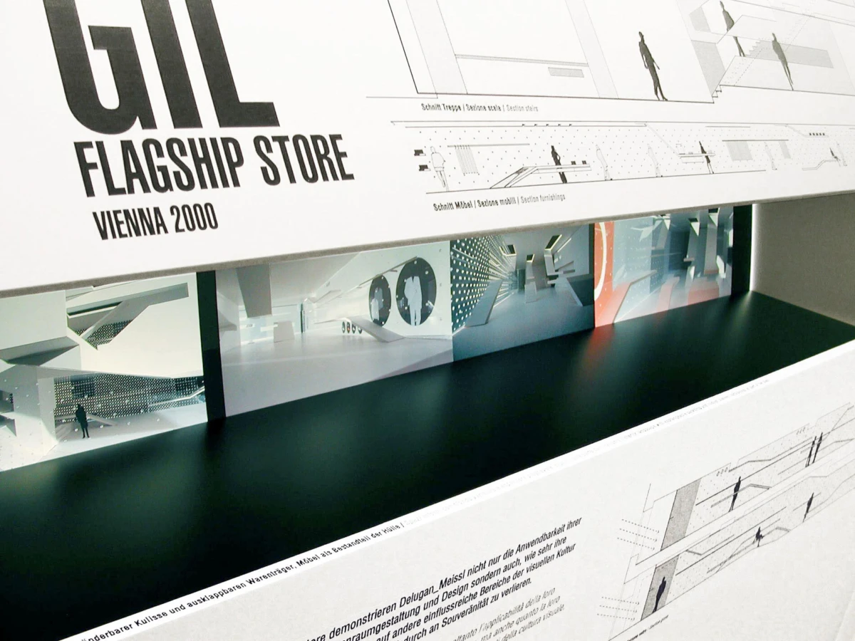 Architectural model display of a flagship-store concept, with large text reading GIL FLAGSHIP STORE VIENNA 2000.
