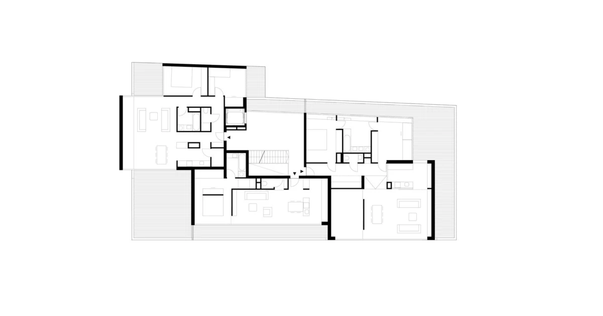 Architectural floor plan of a multi-room residence with terraces, depicting living areas, bedrooms, and bathrooms.