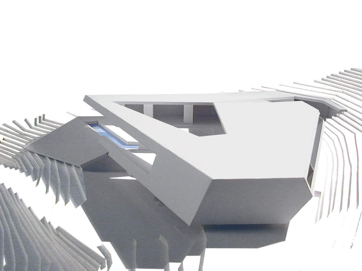 White angular architectural model with overlapping slabs and curved, ribbed fins on both sides.