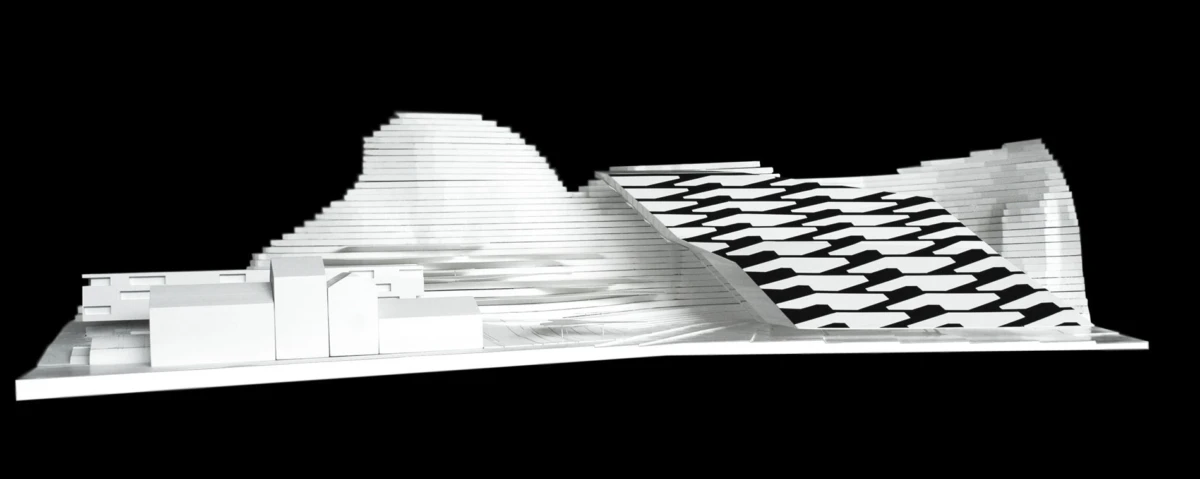 Architectural scale model of a futuristic complex with curved white volumes and a striped, sloped roof on a base against a black background.