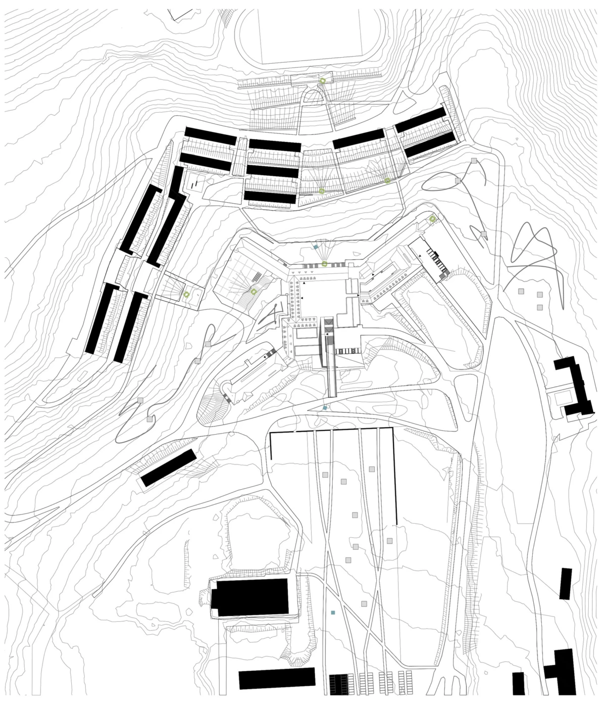 Topographic site plan showing a hilltop campus layout with terraced contours and numerous rectangular buildings connected by roads.