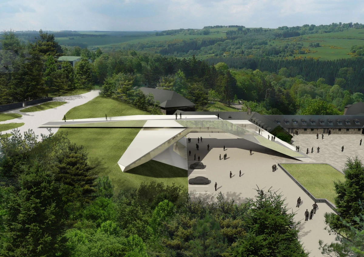 Futuristic white angular pavilion on a grassy slope with an elevated walkway and visitors, set in a forested hillside landscape.