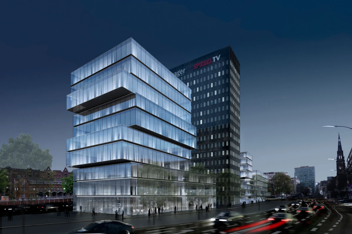 Modern glass office building with stacked cantilevered floors along a busy city street at dusk