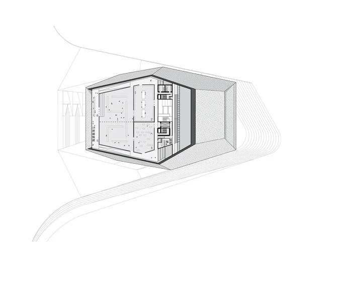 Isometric cutaway of a rectangular electronic module inside a hexagonal enclosure, revealing internal circuitry and a tunnel-like background.
