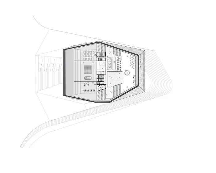 Top-down layout showing a hexagonal space capsule cabin with control panels inside a curved tunnel.