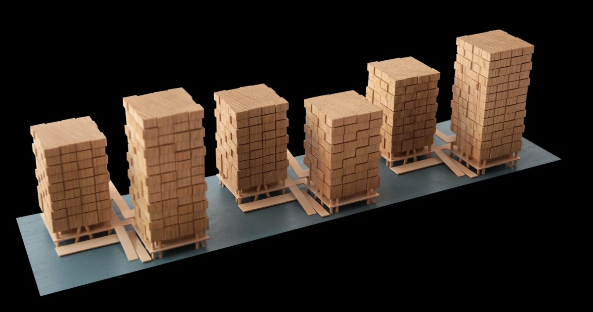 Six tall stacks of wooden blocks on pallets, arranged along a blue-gray platform against a black background.