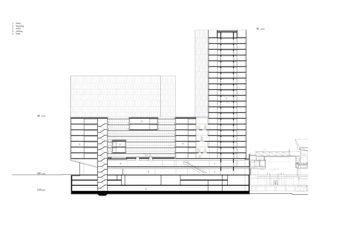 Architectural cross-section of a multi-block building with a tall tower, showing floors, staircases, and underground levels.
