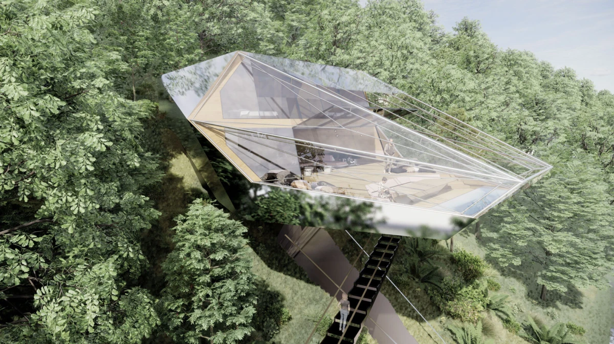 Cantilevered glass treehouse with angular geometry in dense forest; a person stands inside near the glass walls, accessed by a narrow staircase.