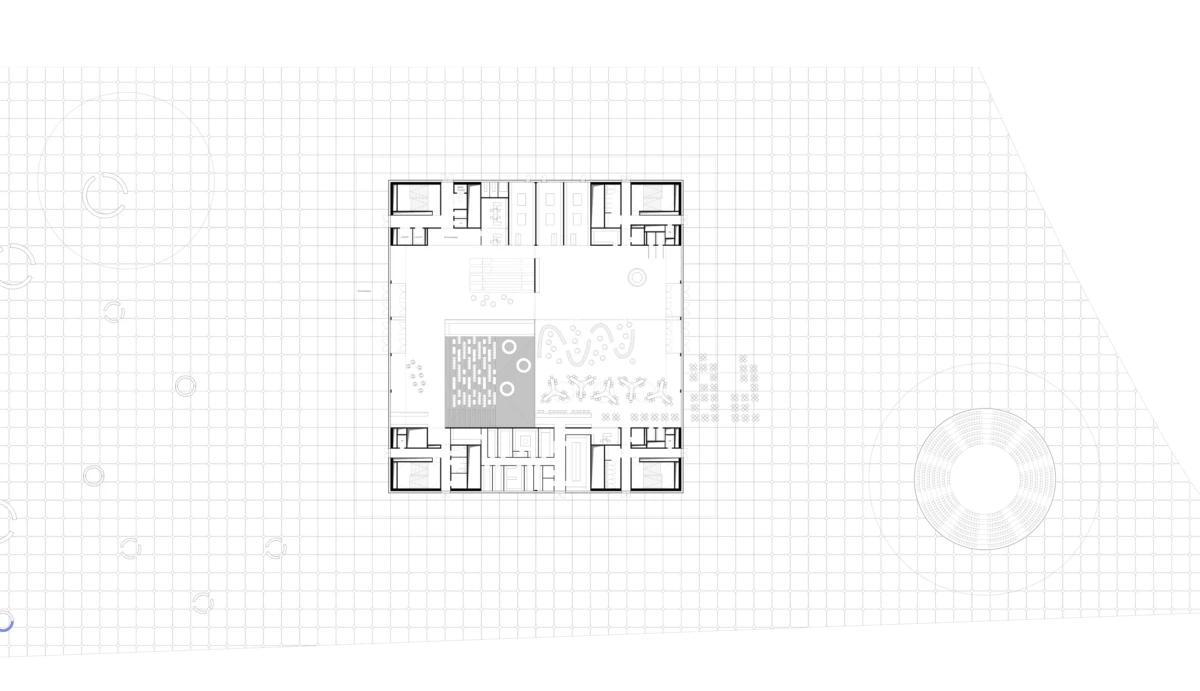 Architectural floor plan: central square building with surrounding rooms on a gridded site; circular pavilion on the right.