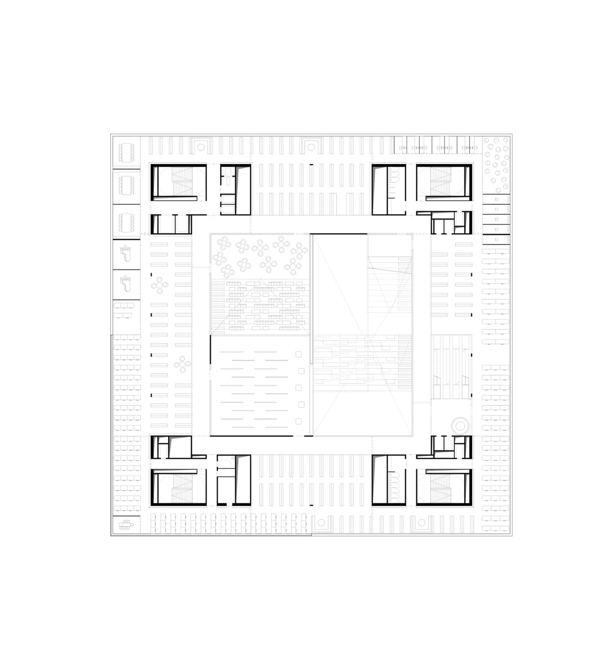 Top-down architectural floor plan of a square building with a central courtyard, surrounding parking bays, and corner stair/room blocks.