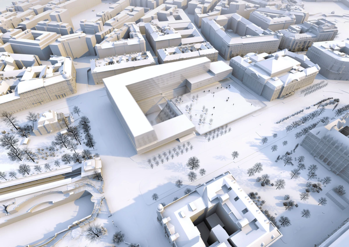 Snowy aerial view of a U-shaped modern building enclosing a plaza; people walk in the central courtyard amid a winter cityscape.