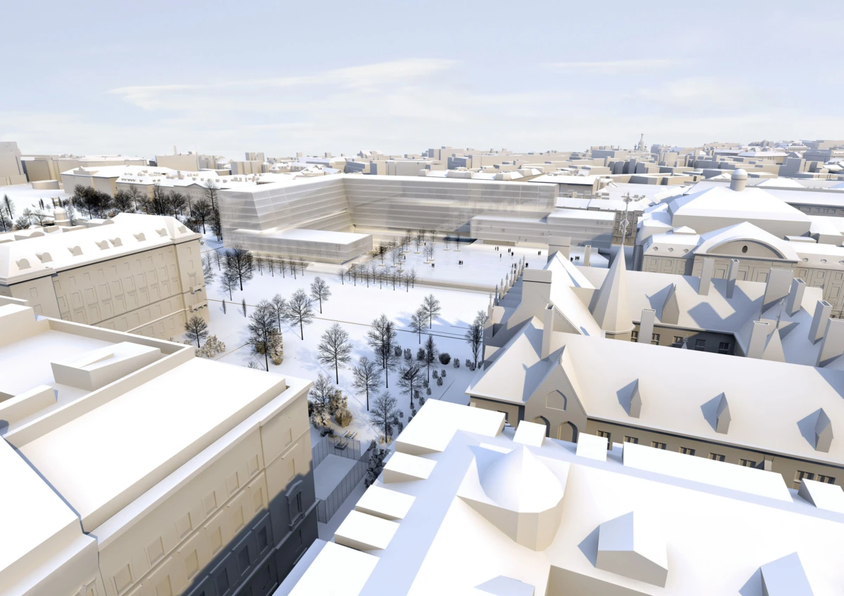 Snow-covered cityscape with leafless trees in a square park, surrounded by beige buildings and snow-coated rooftops under a clear sky.