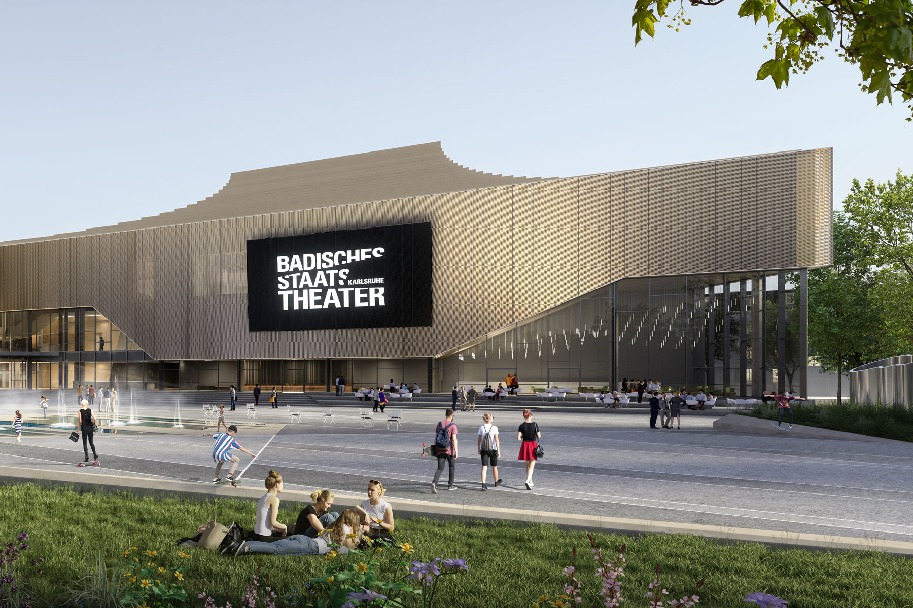 Front of a modern theater with sign Badisches Staats Theater Karlsruhe; people walk, sit, and play near fountains in a plaza.