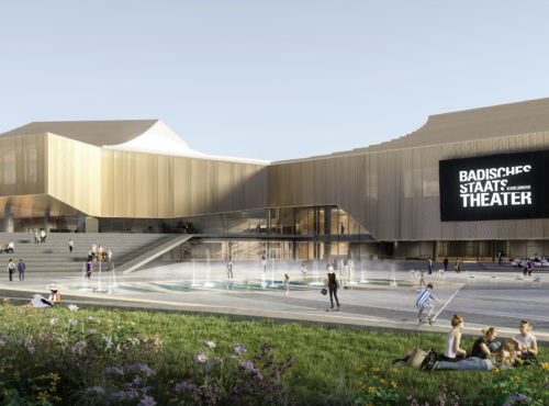 Modern theater building with a large black sign reading BADISCHES STAAT THEATER on the façade, in a plaza with steps, a water feature, and greenery.