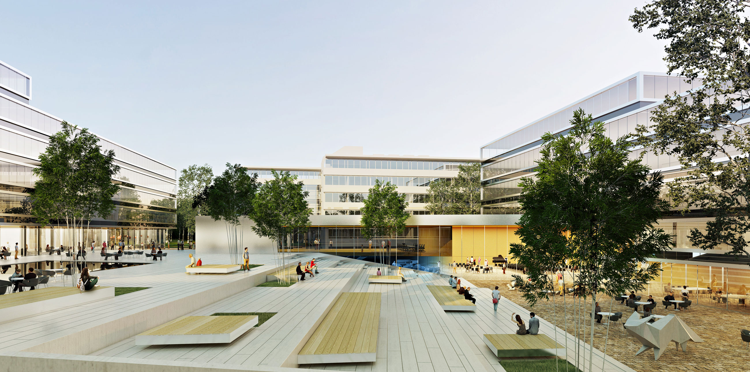Modern university courtyard with tiered wooden platforms and benches, trees, and glass-fronted buildings; people sit, walk, and chat.