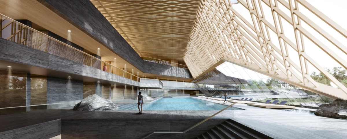 Indoor pool in a modern atrium with glass walls and a latticed wooden ceiling; two people stand at the pool edge.