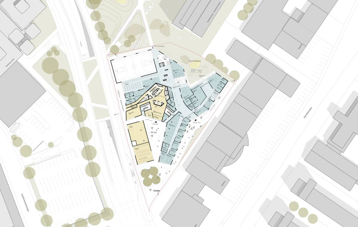 Site plan of a triangular urban block with a multi-zone building complex in blue and beige, surrounded by roads and trees.