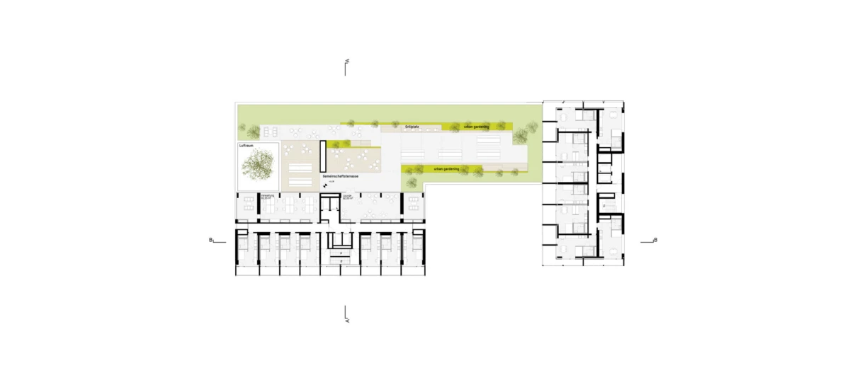 Architectural floor plan of a two-wing building with a central green courtyard and surrounding rooms.