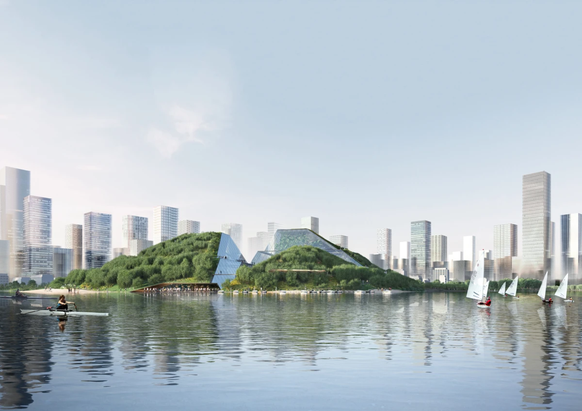 Calm river in front of a city skyline; grassy hill with glass pyramid structures, rower and sailboats on the water.