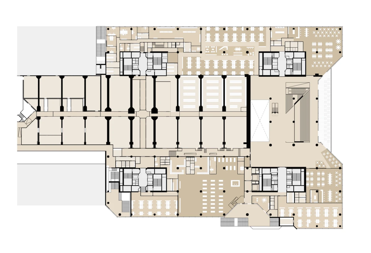 Architectural floor plan of a large multi-wing building with central corridor, offices, meeting rooms, and auditoriums.