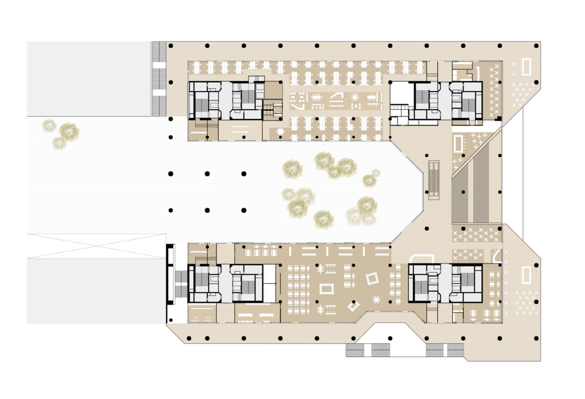 Floor plan of a U-shaped office building with a central courtyard, open work areas, and conference rooms in two wings.