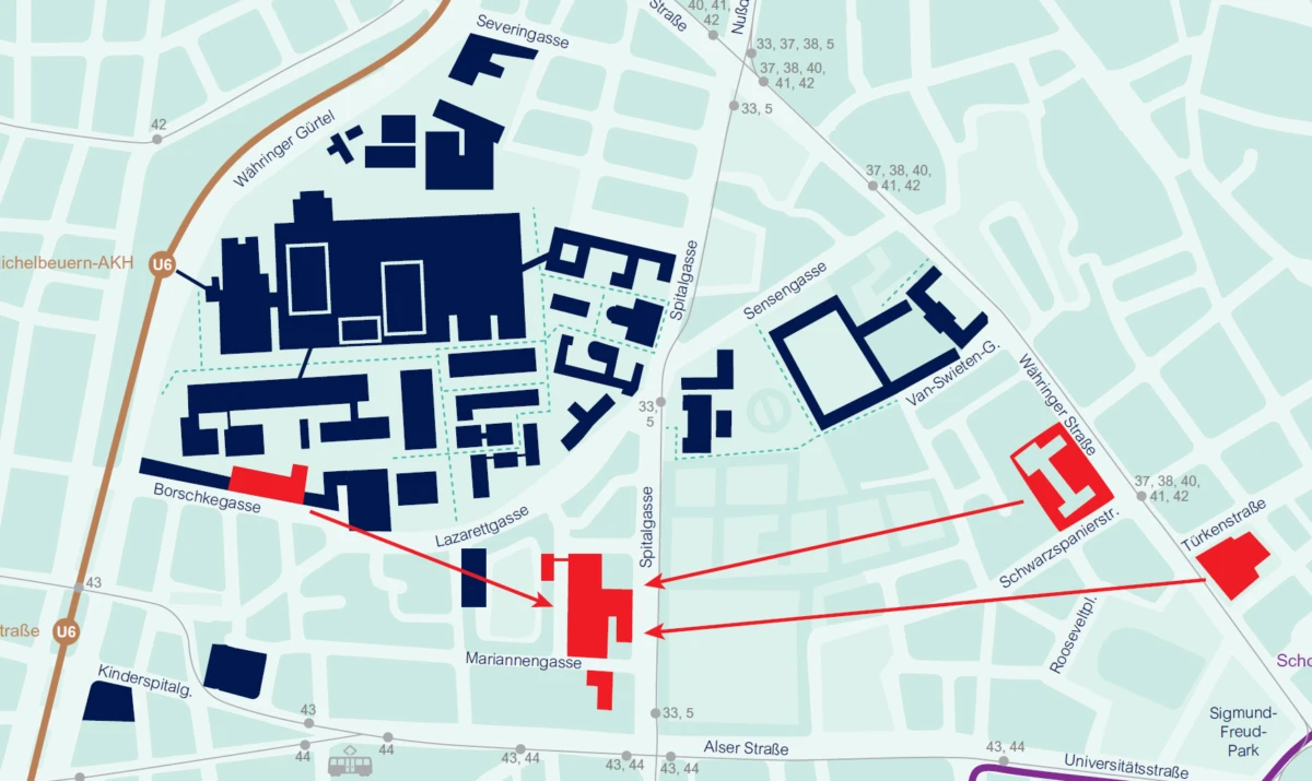 Map showing a cluster of dark-blue buildings on the left and red-outlined buildings on the right, connected by red arrows along streets.