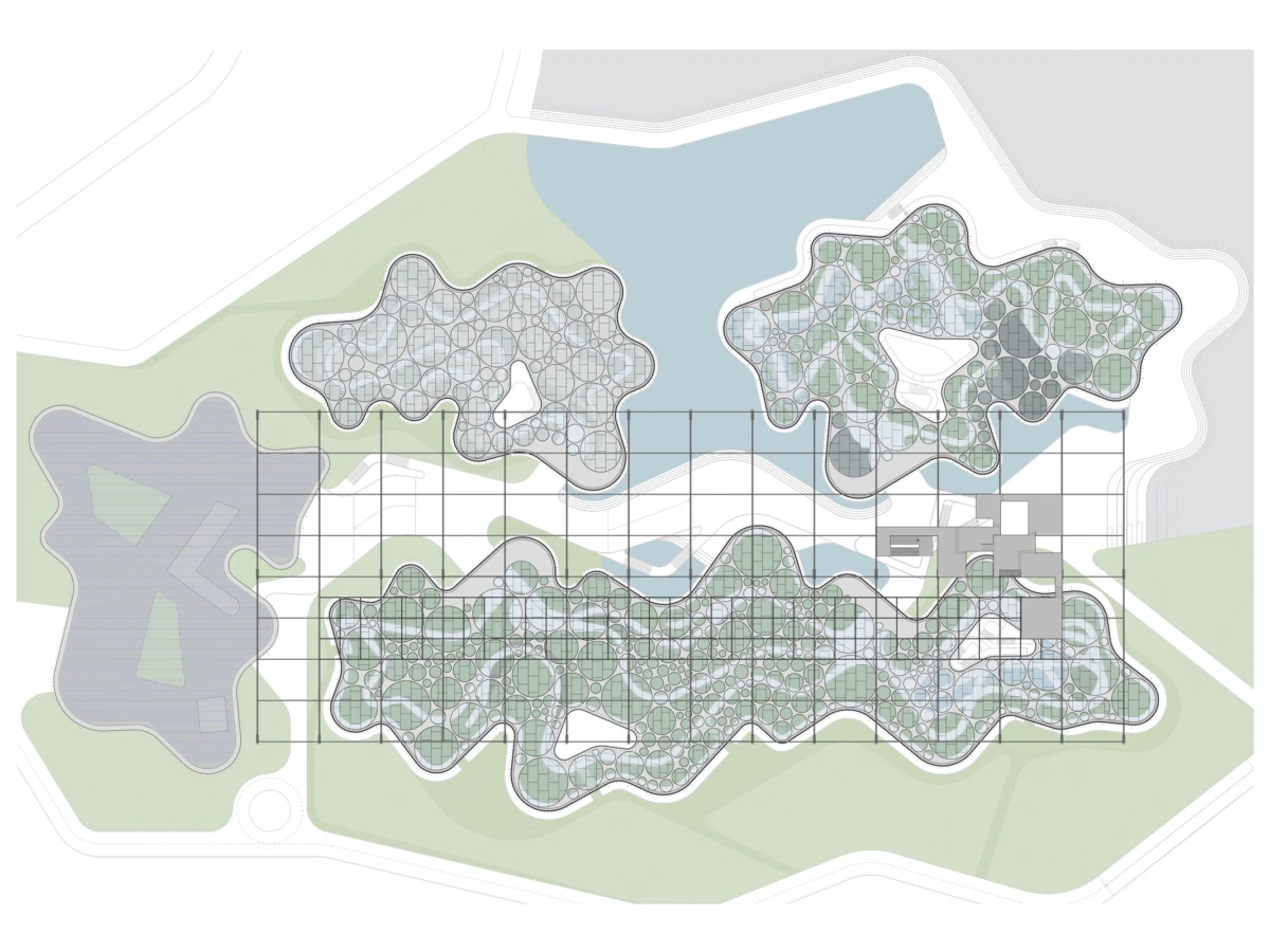 Detailed landscape site plan showing three irregular green lobes, circular paving grids, water features, and a building cluster on the right.