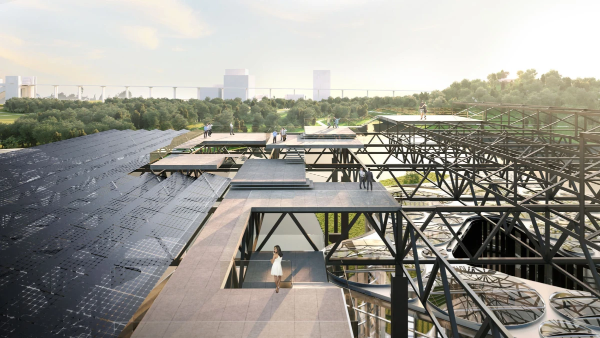 Rooftop with solar panels and black steel truss framework; elevated walkways and people, overlooking a green park.