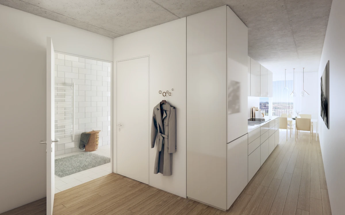 Gray trench coat hangs on wall hooks in a modern white kitchen hallway; open tiled bathroom to left; distant dining area.