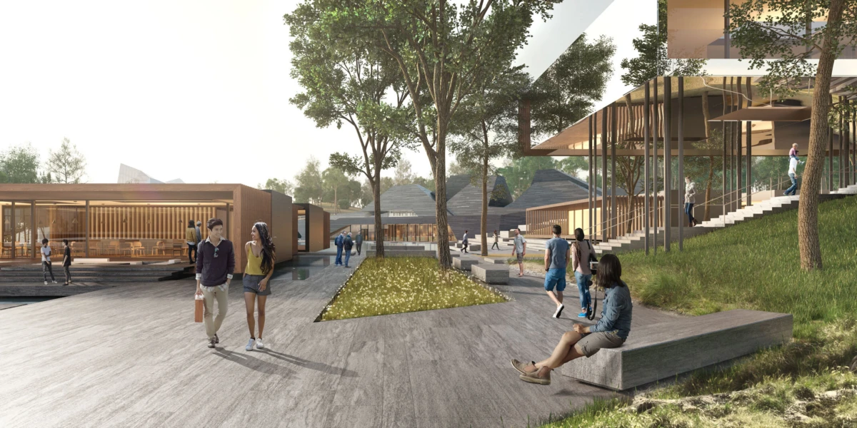 Visitors walk and socialize in a modern outdoor campus plaza with wooden buildings and trees.