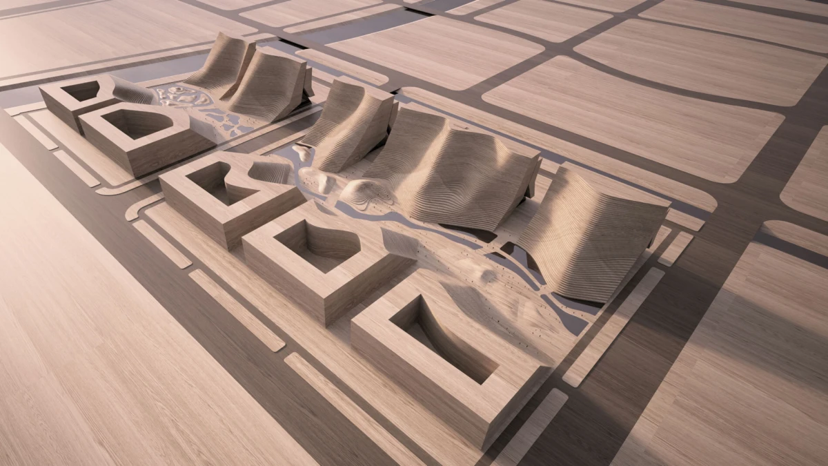 Architectural scale model showing dune-like landscape with curved, stepped seating within a rectangular grid on a wood floor.