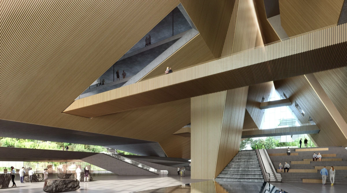 Interior of a modern wooden atrium with oversized diagonal beams, escalator, and tiered seating; visitors walk and ascend.