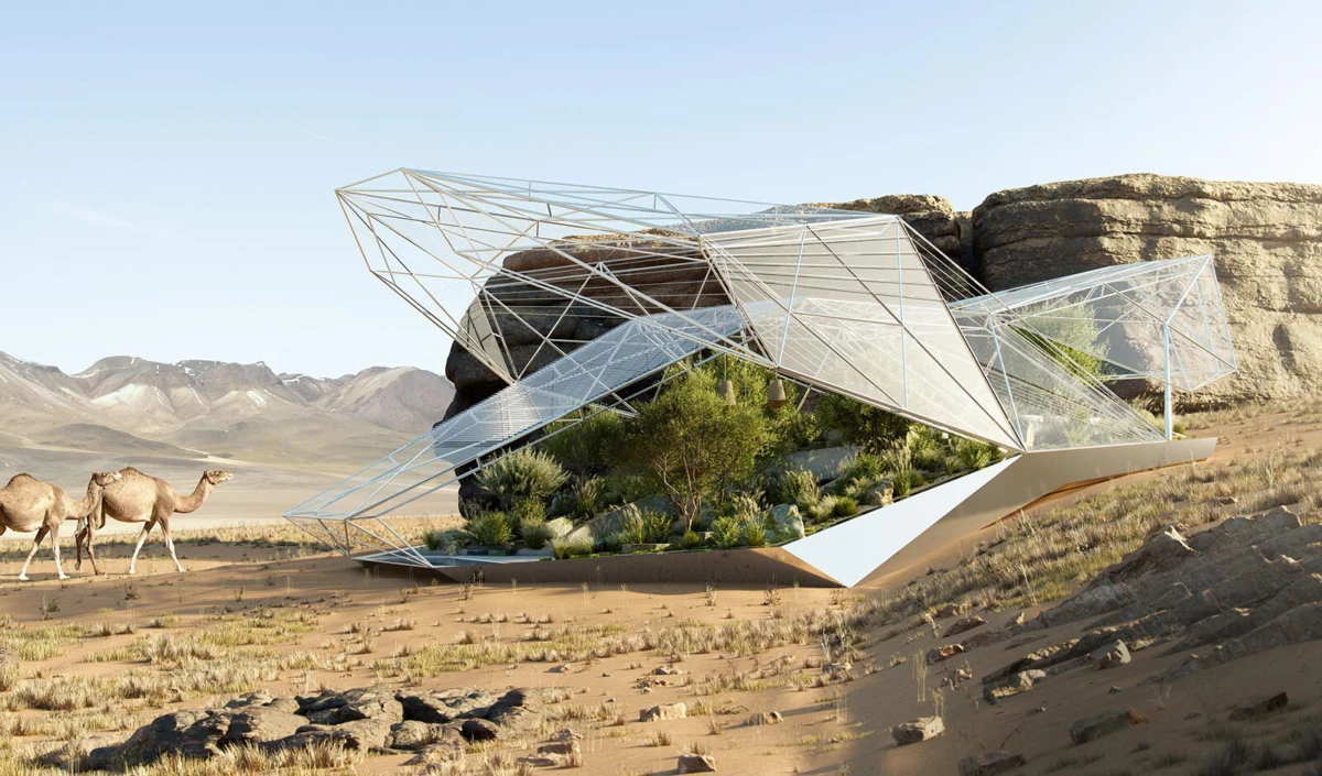 Geometric glass pavilion perched on rock in arid desert; two dromedaries walk toward it, with rocky hills in the background.