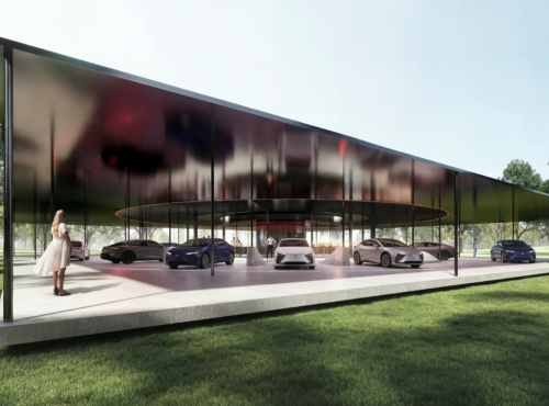 Modern car showroom pavilion with a black reflective roof in a park; cars on display and people nearby.