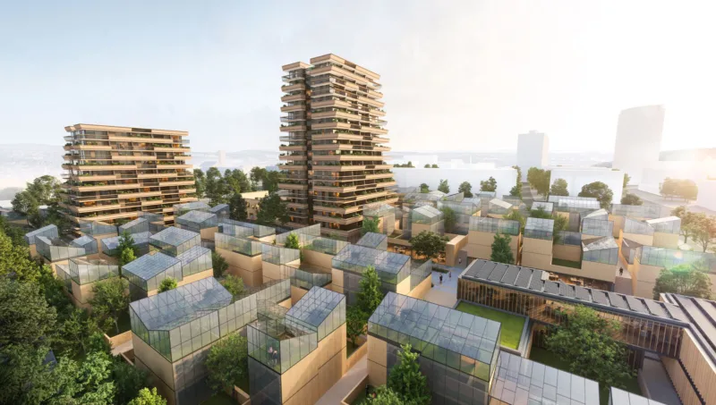 Two tall residential towers overlook a grid of glass-roofed greenhouse buildings in a tree-filled eco-friendly urban district.