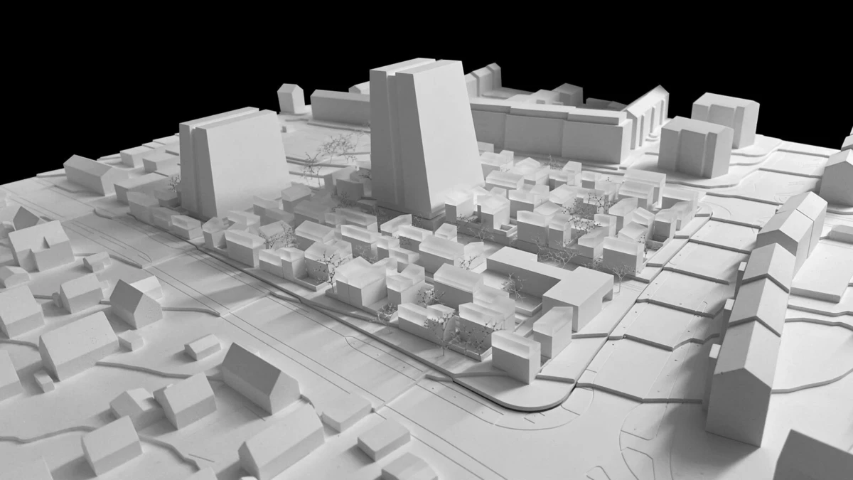 White 3D architectural model of an urban neighborhood with a tall central skyscraper, surrounding low-rise blocks, roads and trees.