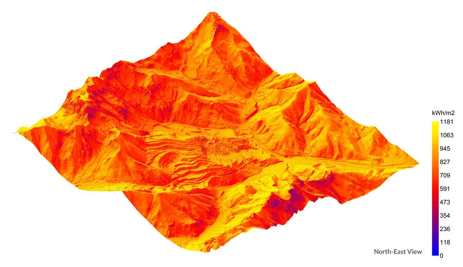 3D mountain terrain colored by solar irradiance (kWh/m2) with right legend.