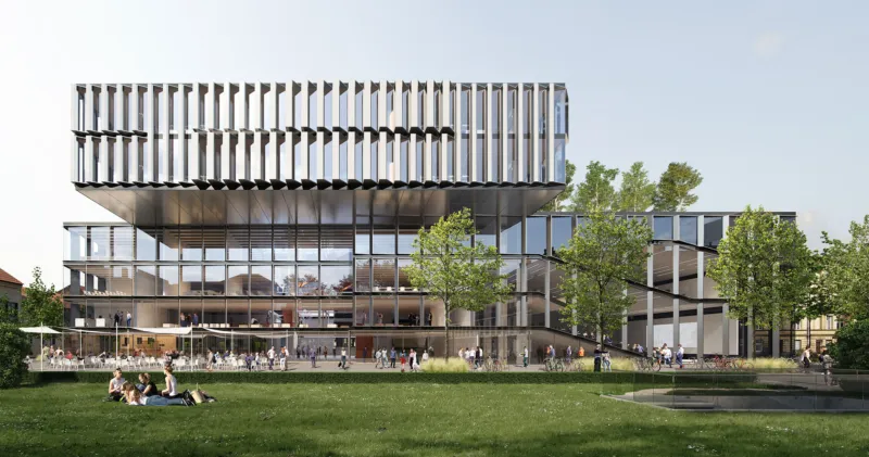 Modern glass office building with stacked sun-shading louvers; people walk and sit on a grassy lawn in front, with trees.