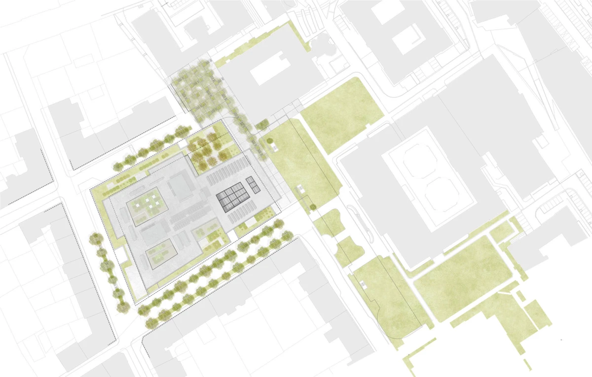 Architectural site plan of a building complex with inner courtyards, green spaces, and surrounding streets.