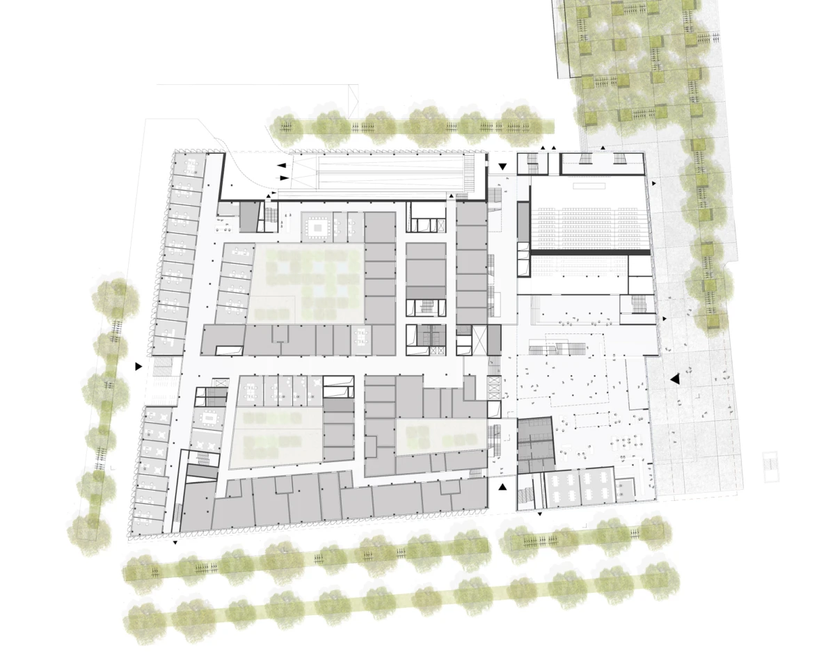 Architectural site plan of a building complex with inner courtyards and tree-lined surroundings.