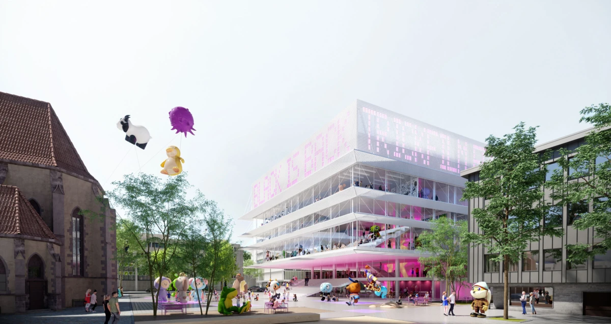 Modern glass, multi-story building with pink lighting; people on balconies and in a plaza. Church on the left; balloons and sculptures in foreground.