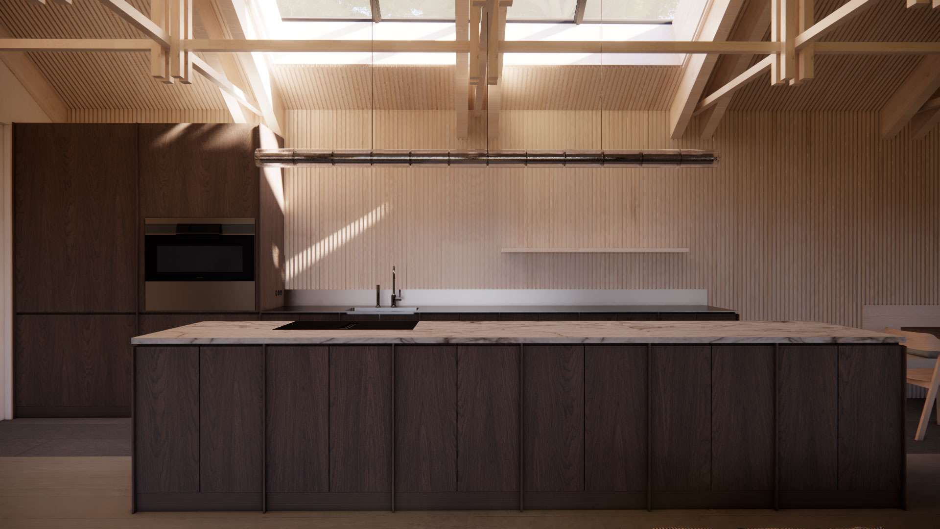 Dark wood kitchen island with built-in sink in a contemporary kitchen; oven visible and skylight-lit high-ceiling space.