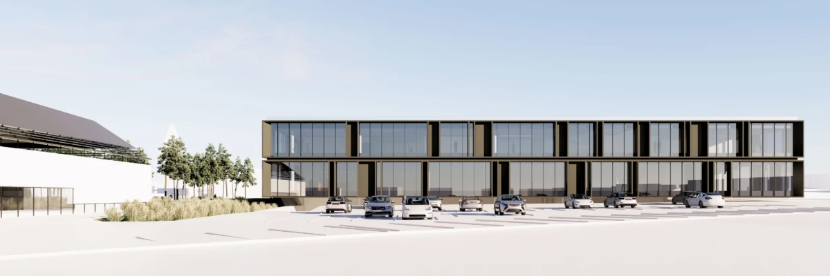 Modern two-story glass-front office building with a row of parked cars in front, and trees lining the left side.