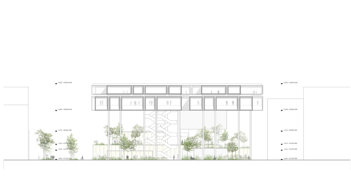 Modern glass office building with a central staircase visible through the facade, set in a landscaped courtyard with trees.