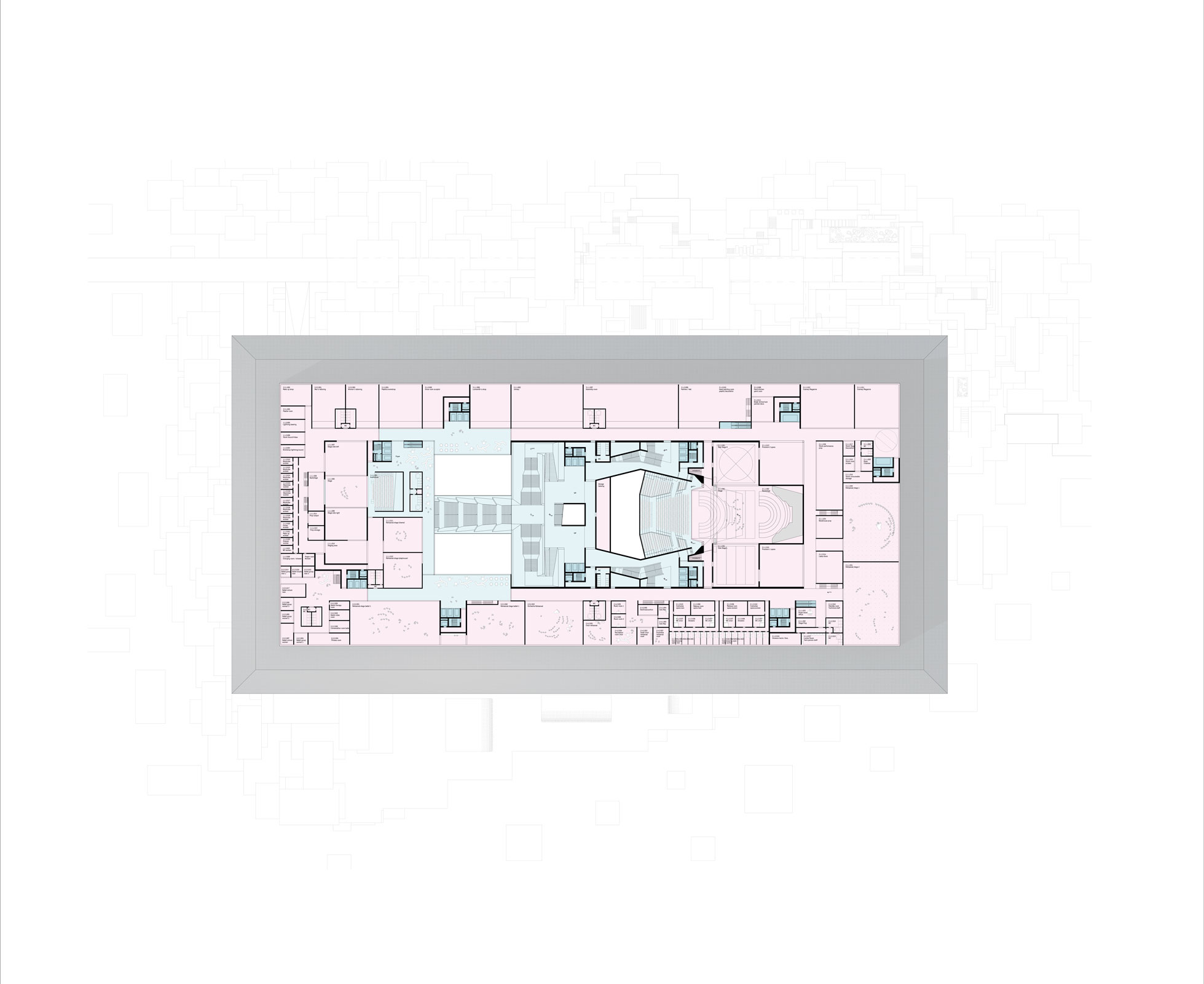 Top-down architectural floor plan of a rectangular building; central auditorium with seating surrounded by multiple rooms; pink and blue zones.