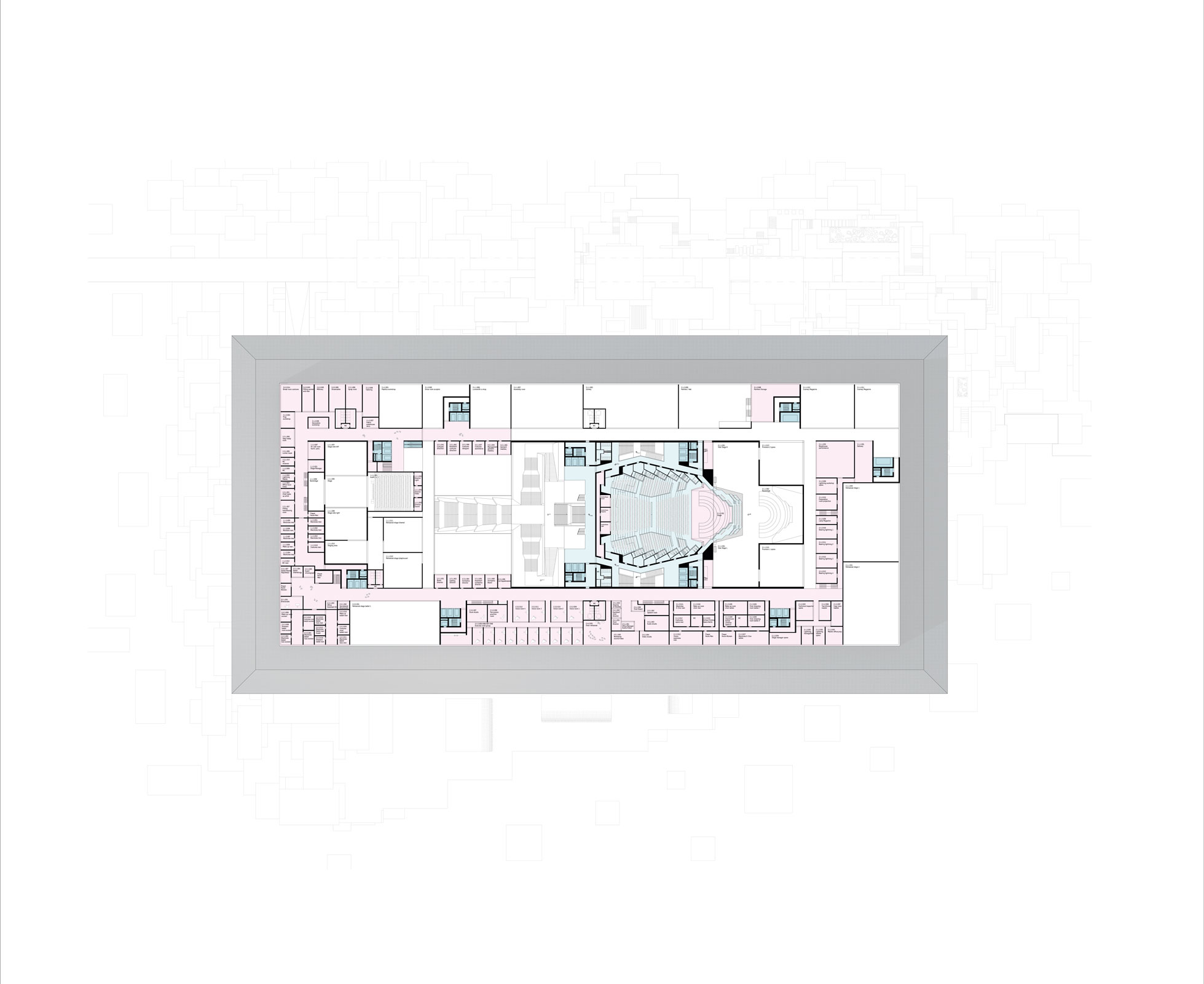 Architectural floor plan of a rectangular building with a central auditorium and surrounding offices.
