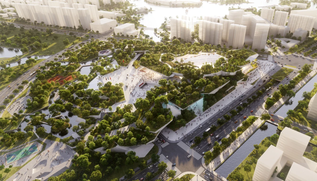 Aerial view of a multi-level urban park with green terraces, curved pedestrian ramps, and surrounding roads and high-rise buildings.
